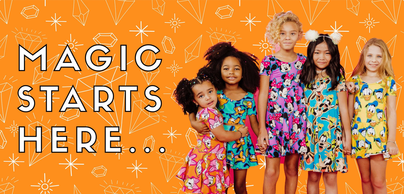 5 girls standing next to each other wearing Wild Rich Kids dresses holding hands. Text says "Magic Starts Here..." Orange background with stars and diamonds.